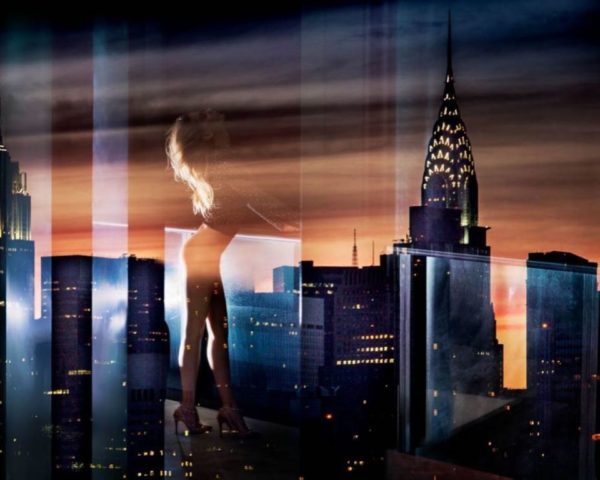 Dreams of nightmares by David Drebin, double exposure of nude model on a balcony and new york with the Chrysler Building by night