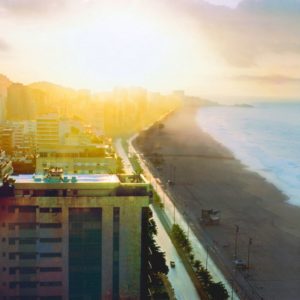 Rio by David Drebin, beach and city with bright sun