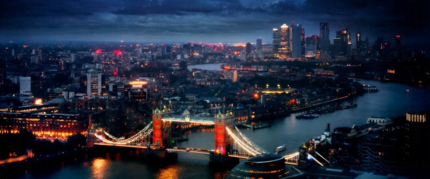 This is London by David Drebin, the citiy with the themese and tower bridge at night