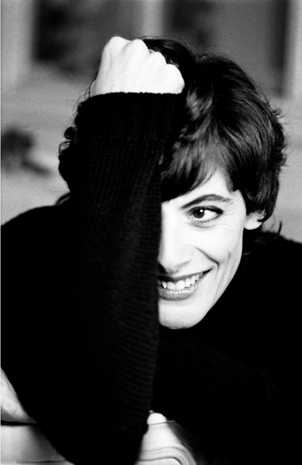 Inès de le Fressange by Gérard Uféras, portrait of the model with short hair, wearing a black knitsweater