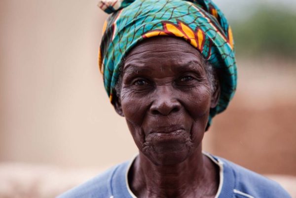 Burkinafaso Ouagadougou by marc Baptiste, portrait of an older black woman wearing a colorful turban