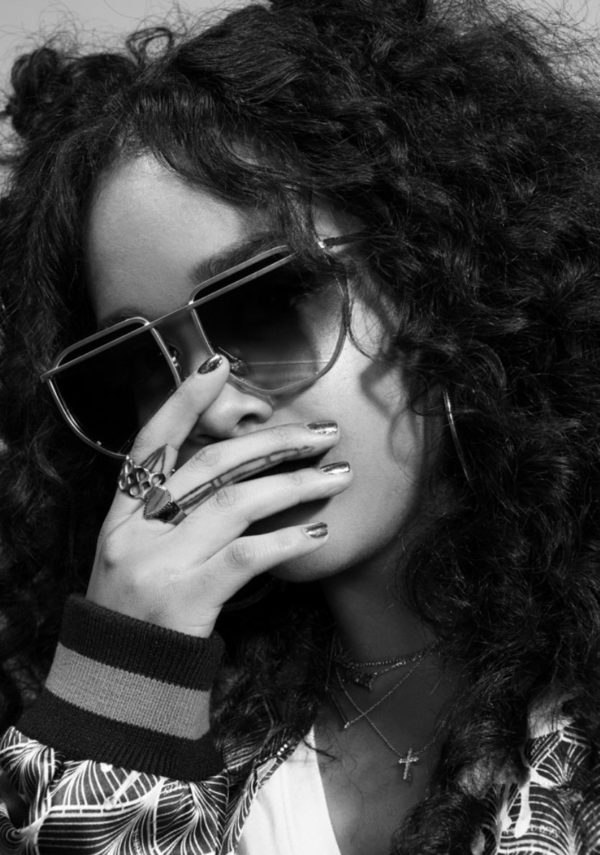 H.E.R., Afropunk by Marc Baptiste, black and white closeup portrait of the singer wearing sungalsses and rings