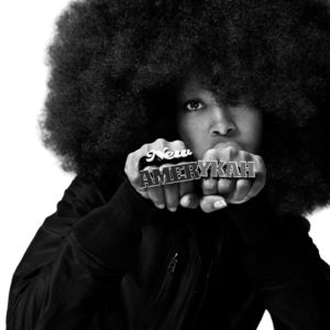 Erykah Badu by Marx Baptiste, black and white portrait of the singer wearing her afro and 'New Amerykah' Rings
