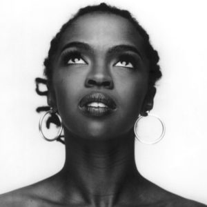 Untitled V by Marc Baptiste, Portrait of the model lauryn Hill wearing hoop earrings, looking up