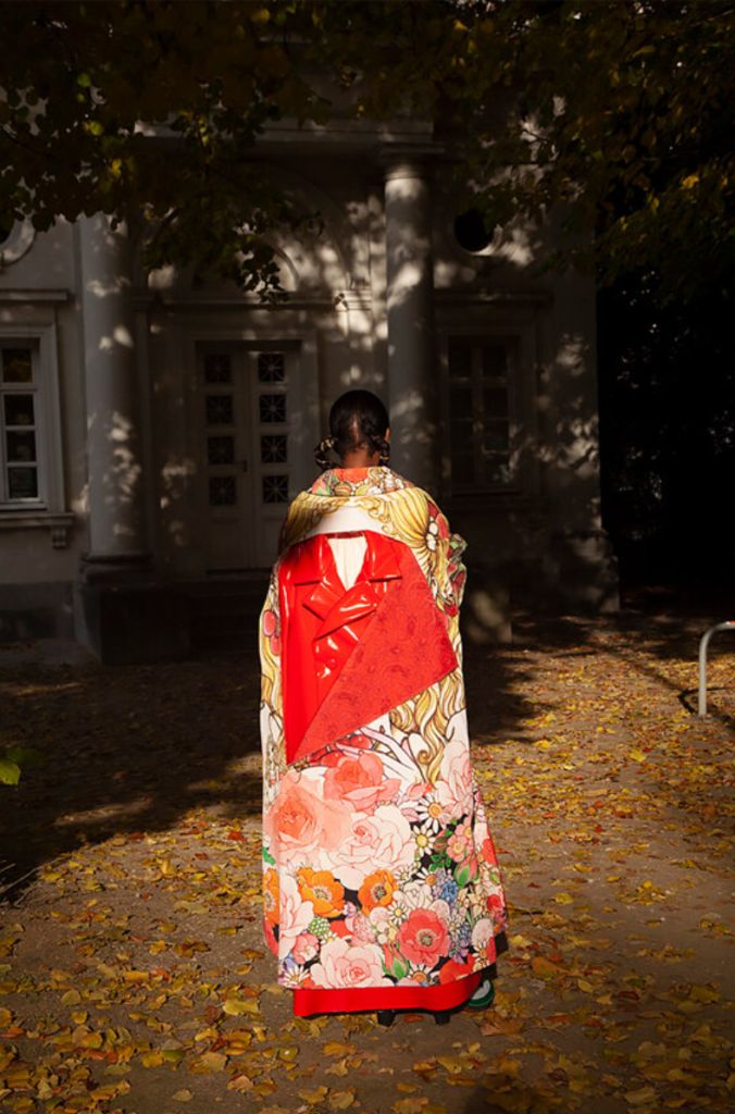 Untitled VII by Marc Baptiste, model in Comme des Garçons kimono inspired cloak in a backyard