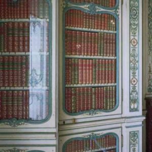 Bibliotheque du Dauphin by Robert Polidori, baroque green and white bookshelf filled with red green and gold books