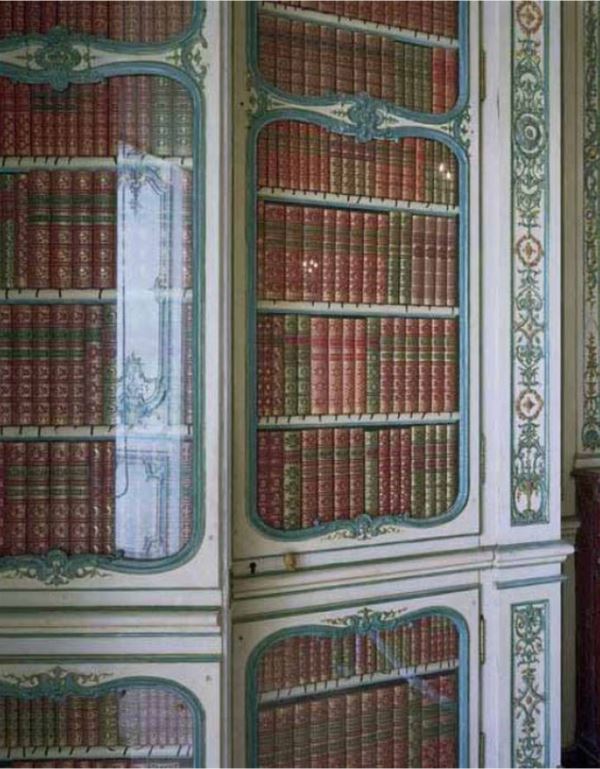 Bibliotheque du Dauphin by Robert Polidori, baroque green and white bookshelf filled with red green and gold books