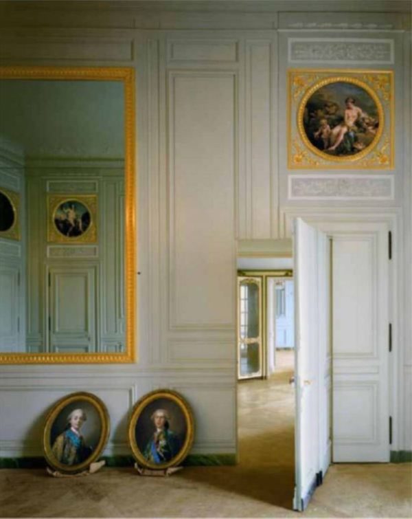 Cabinet Interieur de Madame Adelaide by Robert Polidori, baroque interior with white walls, a huge gold framed morror and oval portraits on the ground