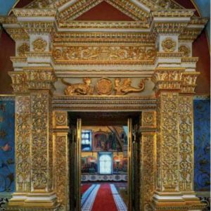 The door into the faceted Chamber, Kremlin, Moscow, Russia by Robert Polidori, entry gate with lavish gold ornaments in front of red and blue wall