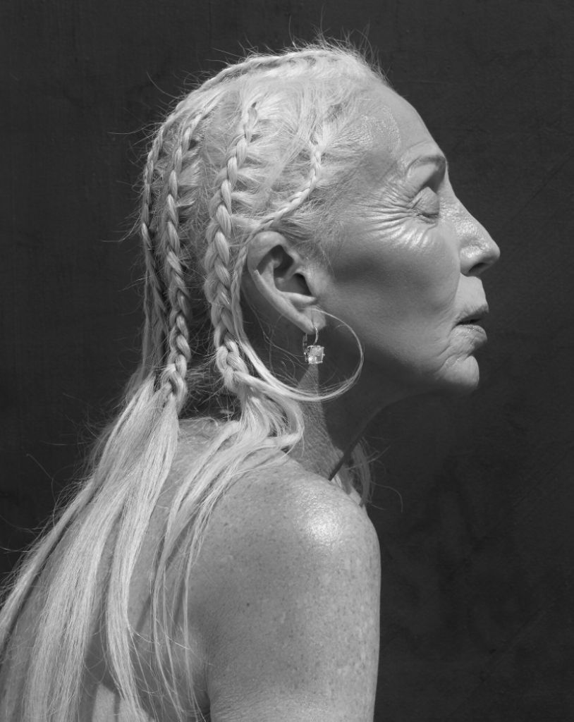 Colleen Heideman by Sylvie Blum, sideprofile portrait of the model wearing braids and diamond earrings