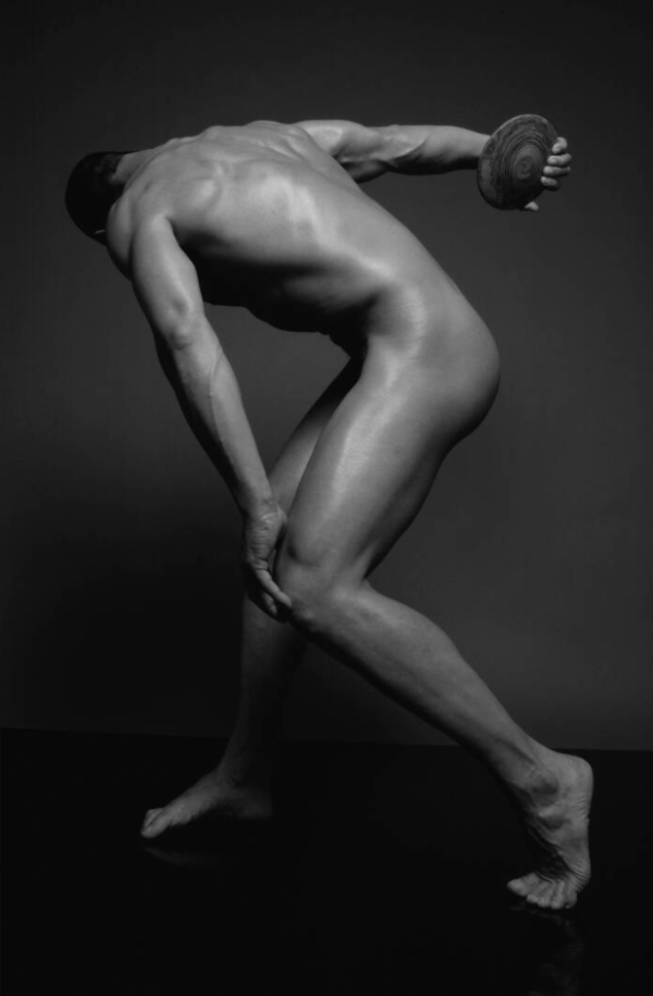 Discus II by Sylvie Blum, male nude bending over to throw a discus