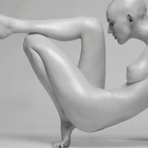 The Angle by Sylvie Blum, bald model crouching