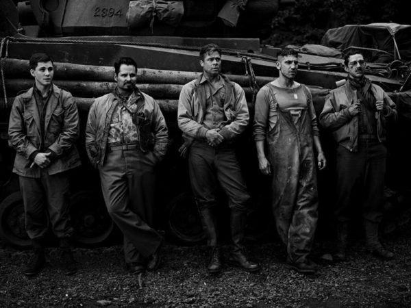 Fury by Timothy White, the main cast of fury leaning on a tank, Logan Lerman, Michael Peña, Brad Pitt, Jon Bernthal, Shia LaBeouf