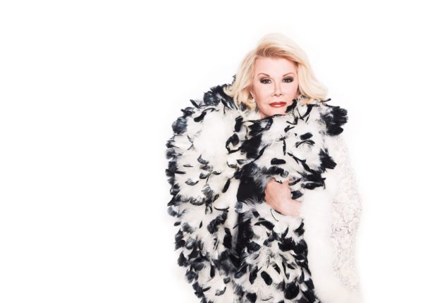 Joan Rivers by Timothy White, portrait of the comedian i a giant black and white feather boa