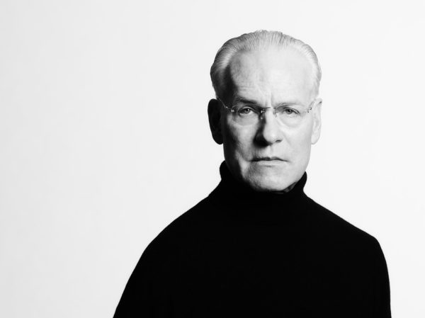 Tim Gunn by Timothy White, black and white portrait of the fashion consultant in a black turtleneck
