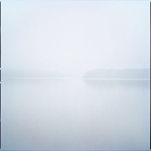 Islands III by Nigel Parry from the Landscapes series, islands in a lake in green and blue mist