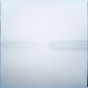 Islands III by Nigel Parry from the Landscapes series, islands in a lake in green and blue mist