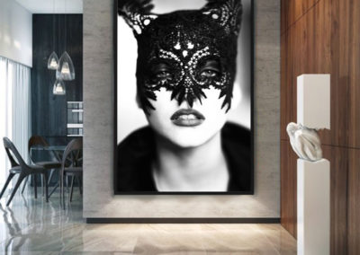 The Mask by Ellen von Unwerth, framed, hanging in a dining room