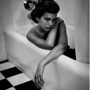 Georgia by Vincent Peters, model in bathtub with checkerboard tiles