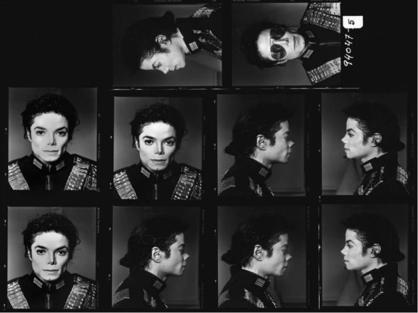 Michael Jackson 1994 by Timothy white, contact sheet of black and white portraits of the singer in performance wear