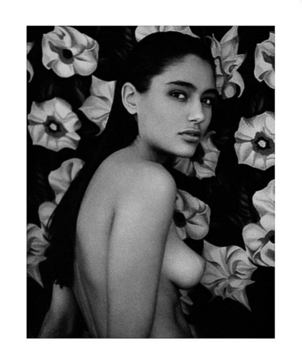 Brenda, Milan by Bruno Bisang, nude in front of a flower wallpaper