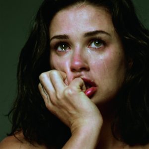 Demi Moore by Michel Comte, closeup portrait of the actress crying