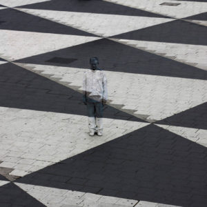 Hiding in Sweden by Leo Bolin, black and white Plaza with person painted to disappear