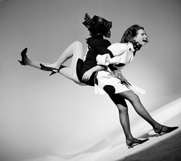 Linda Evangelista and Christy Turlington, 1990 by Arthur Elgort, the models dressed in black and white with polkadots, one lifting the other