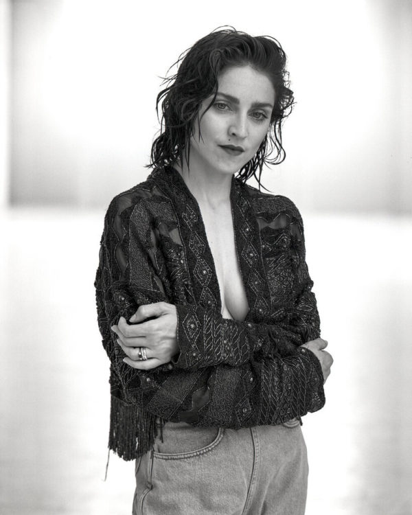 Madonna, New York City by Arthur Elgort, black and white portrait of the singer with wet hair, in an ethno style jacket