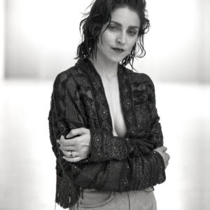 Madonna, New York City by Arthur Elgort, black and white portrait of the singer with wet hair, in an ethno style jacket