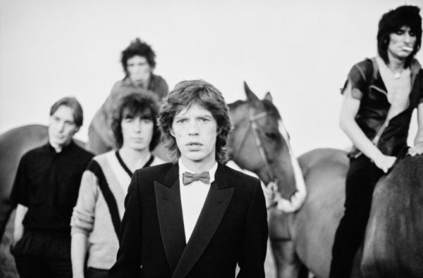 The Rolling Stones by Arthur Elgort, portrait of the Band with two horses
