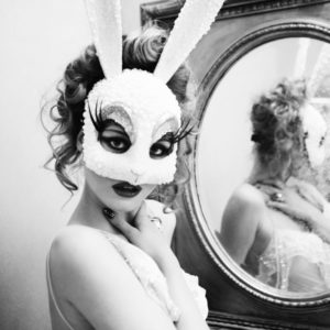 Bunny by Ellen von Unwerth, model in white crystal bunnymask with mirror