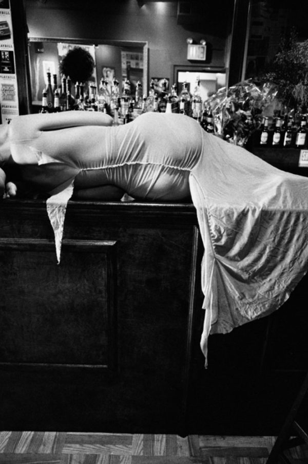 Elisa Jimenez, Ready to wear NY by Gérard Uféras, model in white dress lying on bar