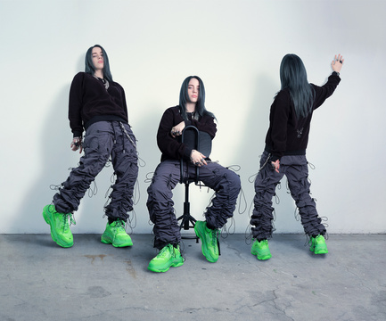 Billie Eilish Triptych by Markus Klinko, the singer three times in black with neon green shoes