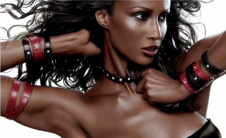 Iman with Bracelets by Markus Klinko, the Model with black and red leather bracelets