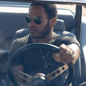 Lenny Kravitz by Jesse Frohman, the singer with sunglasses in a vintage car