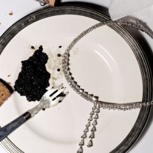 Diamonds with Caviar by Jesse Frohman, plate with caviar and diamond necklace