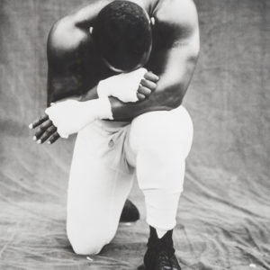 Mike Tyson by Michel Comte, the Boxer in white Pants and Boxing-wraps