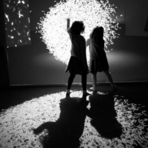 Gaîté Lyrique by Gérard Uféras, two girls in front of a bright light