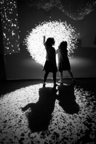 Gaîté Lyrique by Gérard Uféras, two girls in front of a bright light