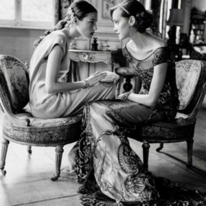 Haylynn Cohen and Lida Egorova for British Vogue at Château De Thoricourt, Belgium 1998 by Arthur Elgort - two Models in embroidered dresses sitting in baroque interior