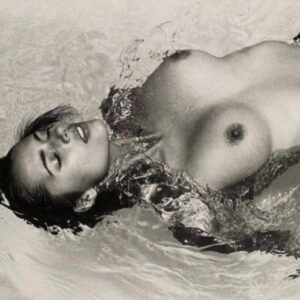 Heather Stewart Whyte by Arthur Elgort - nude model floating in clear water