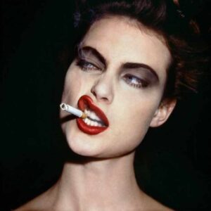 Shalom Harlow by Roxanne Lowit - portrait of a model with smokey eyes, red lips and cigarette