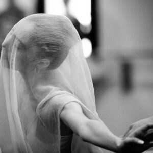The Veil, Scala by Gérard Uféras - black and white Portrait of a female dancer with a white Veil