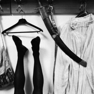 Gran Teatro La Fenice, Venise, Italie, 1992 iii_Un Fantôme à L'Opéra by Gérard Uféras - upside down legs in black tights with coat hooks