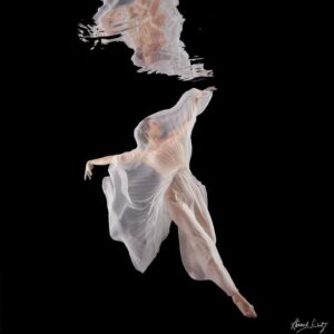 Underwater Study #3058 by Howard Schatz - Model in transparent white dress floating underwater