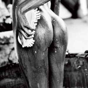 Squeeze and Shape, Heimat by Ellen von Unwerth - black and white closeup of a model cleaning herself with a sponge