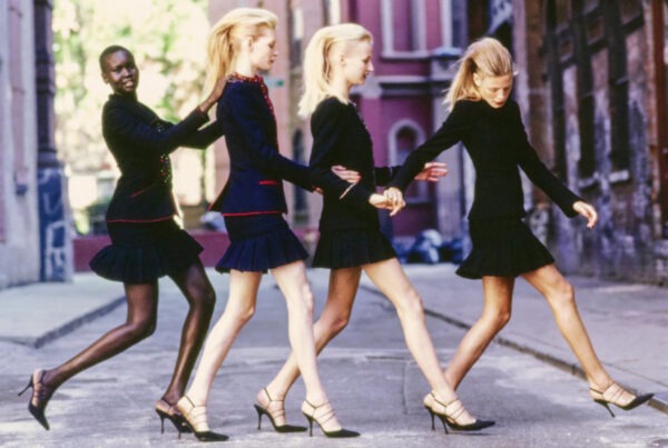 Four models (from left: Alek Wek, Kirsten Owen, Esther de Jong, Tanga Moreau) crossing a street