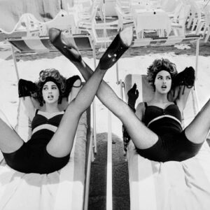 Christy Turlington and Linda Evangelista, Cannes 1990 by Ellen von Unwerth, two supermodels lying on sunbeds with spread legs