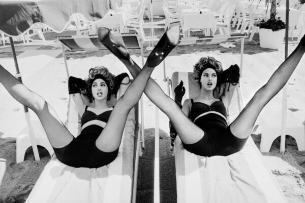 Christy Turlington and Linda Evangelista, Cannes 1990 by Ellen von Unwerth, two supermodels lying on sunbeds with spread legs